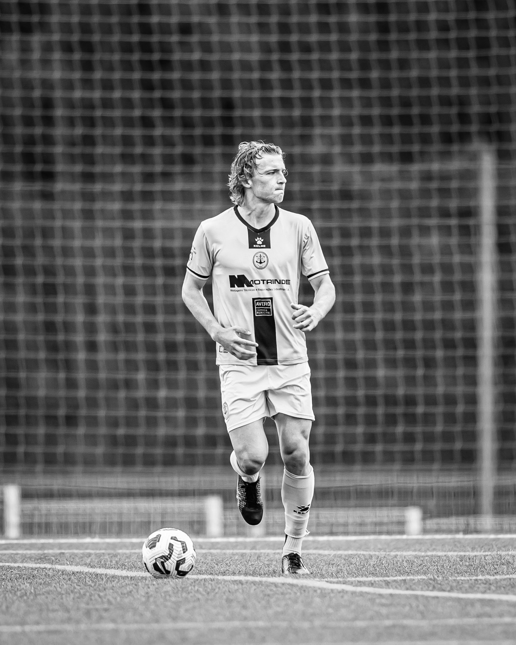 The founder on the pitch, black and white